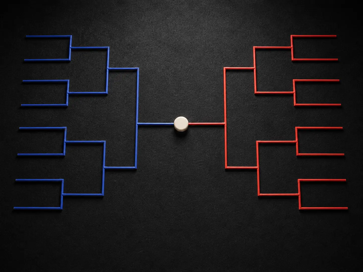 Red and blue physical tournament rails converging on one ivory marker